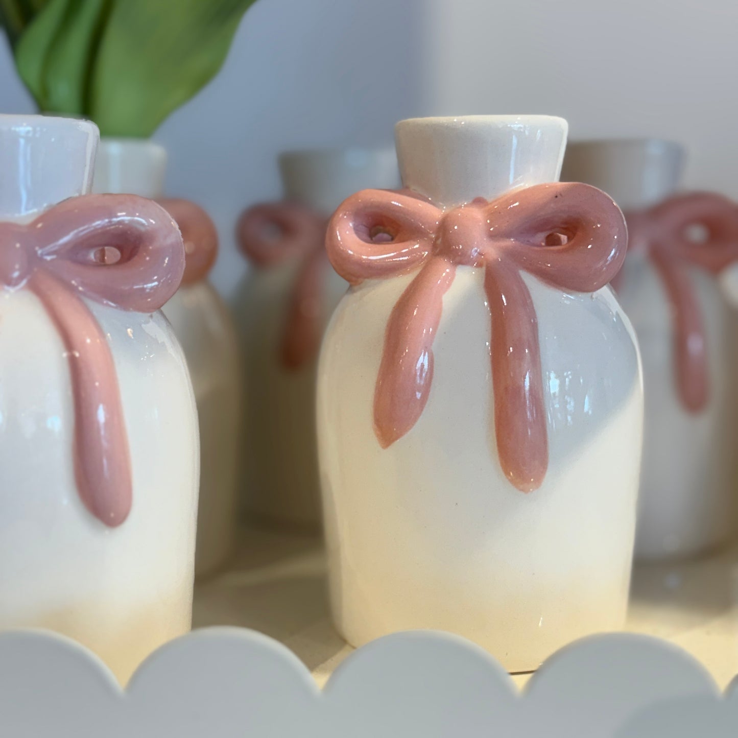 Bundle of joy, a pink ribbon vase